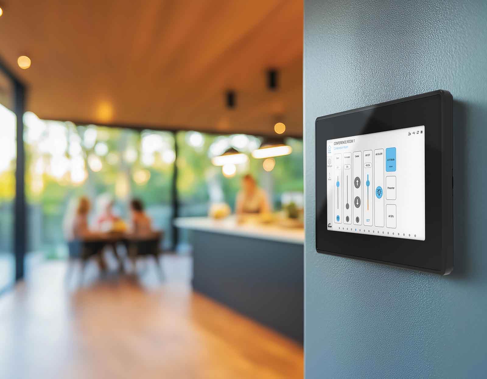 A wll-mounted lighting controls unit inside a cafe